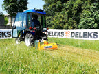 DELEKS APE flail mower mounted on a compact tractor mowing tall grass
