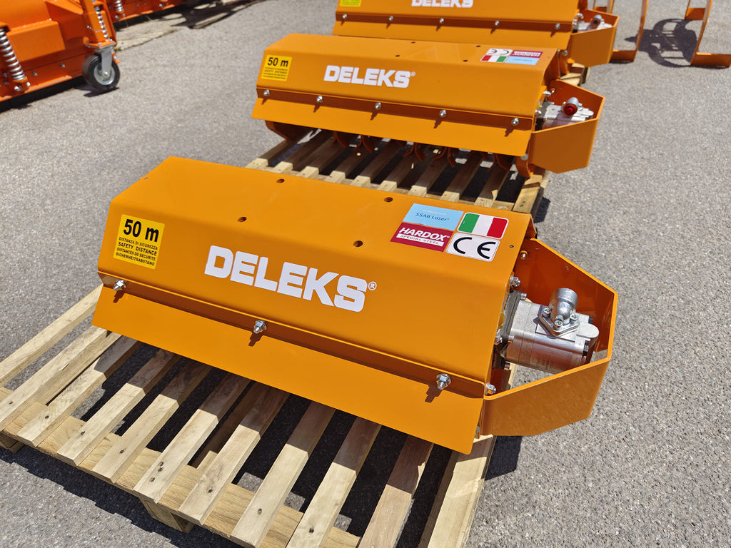 Rear view of the DELEKS AR mulcher head on a pallet