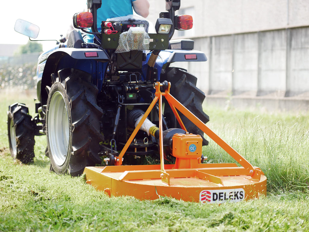 DELEKS BUGGY rotary cutter mounted on a compact tractor