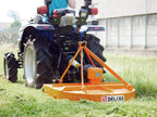 DELEKS BUGGY rotary cutter mounted on a compact tractor