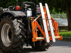DELEKS D-700 pallet forks mounted on a tractor with tines folded up