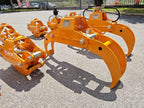 DELEKS DK10H log grapples lined up outside the factory