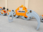 DELEKS DK11 log grapple in the factory yard, three-quarter view