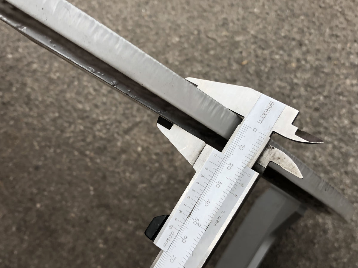Caliper on the tine edge of the DELEKS DK16 log grapple