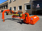 DELEKS GIRAFFA verge mower with arm fully extended outside the factory