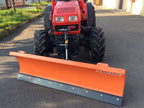 DELEKS LNS snow plow mounted on the front of a compact tractor