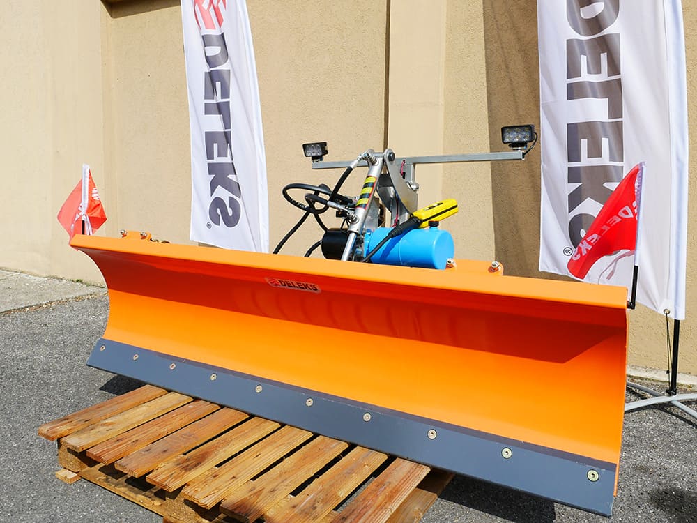 DELEKS LNS-J snow plow blade on a pallet, front view