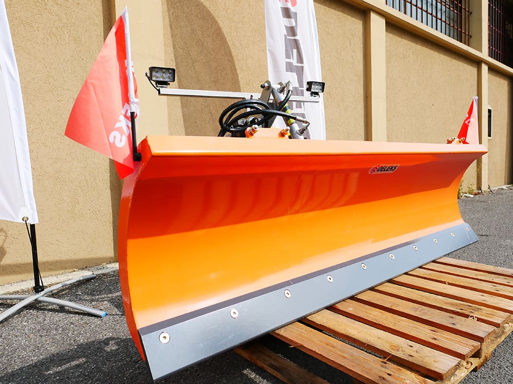 DELEKS LNS-J snow plow blade angled to the side