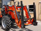 DELEKS DK1T bale fork mounted on a Kubota front loader, side view