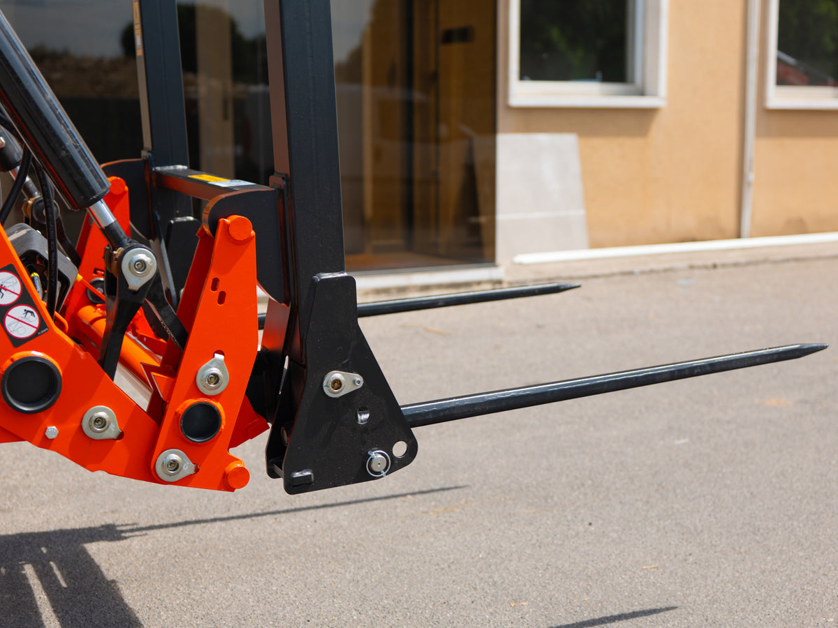 Close-up of the folding tine pivot on the DELEKS DK1T bale fork